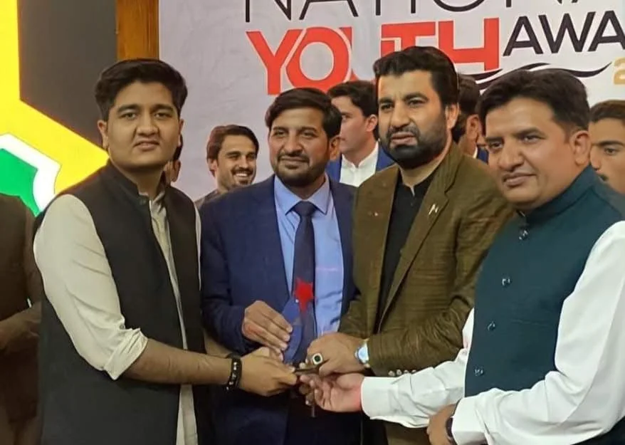 Salman Ahmad Awan with other attendees at a youth award event